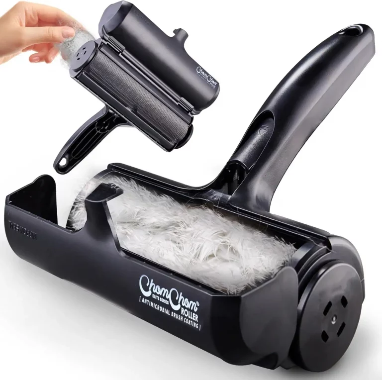 A close-up view of the device opened up to reveal the waste compartment filled with collected white fur, displaying the internal brush mechanism
