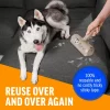 reusable-lint-roller-husky-dog-couch A husky dog lying on a dark grey sectional sofa while a hand cleans the upholstery with the reusable roller. Text highlights that no sticky tape is required